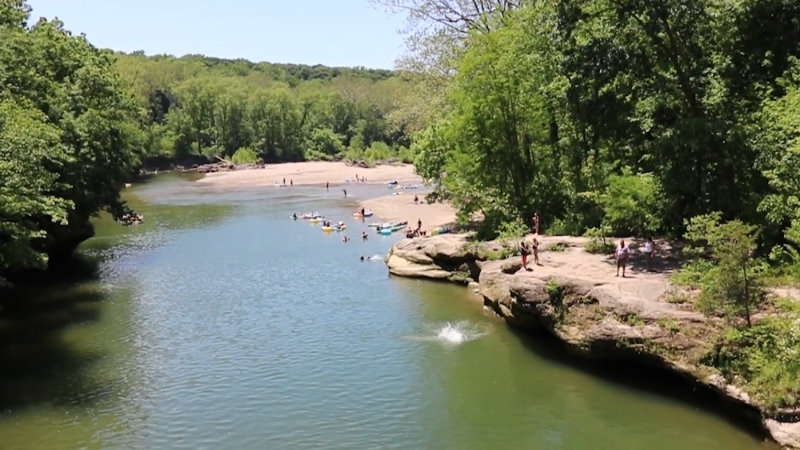 People Enjoying the Water and Scenic Views Along a River at Turkey Run State Park